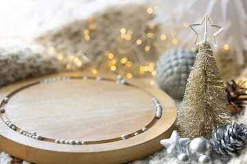 Christmas background with wooden element and silver and gold decorative details.