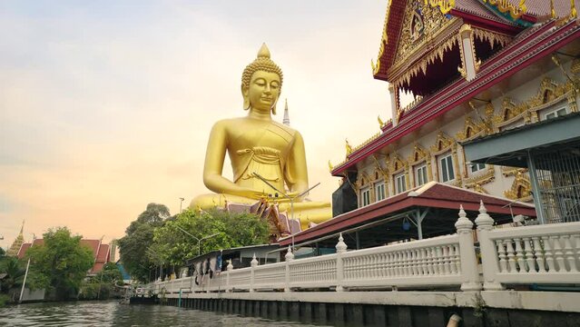 The giant buddha statue at the Wat Paknam Phasi Charoen temple in Bangkok, Thailand. Famous buddhist and the peaceful beauty in Bangkok, Thailand