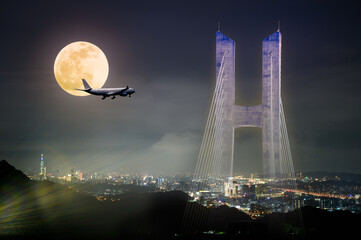 Travellers eager to get home as soon as possible . An airplane flies before the full moon. The...