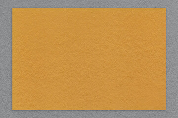 Texture of craft dark orange color paper background with gray border, macro. Structure of vintage kraft cardboard