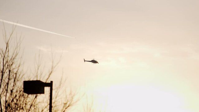 News helicopter hovering over crime scenes for the news. Slow motion footage. 