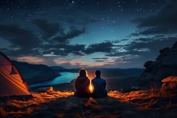 Fotobehang Imaginative couple camping outdoors and watching the starry sky at night, camping at night starry sky, couple watching the starry sky © Peng