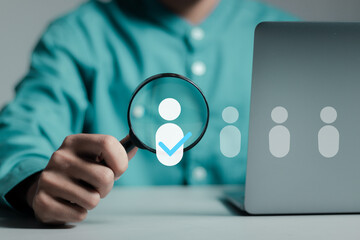 HR human resources  technology. Human resource manager uses magnifying glass with Hr icon to select...