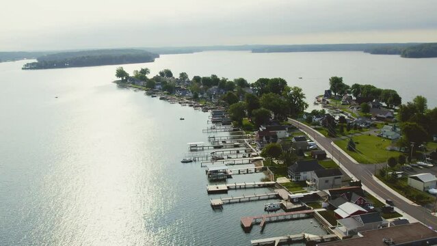 Drone shot of the beach houses and boats at Sodus point New York vacation spot at the tip of land on the banks of Lake Ontario.
