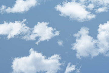 White clouds on a blue sky on a sunny day