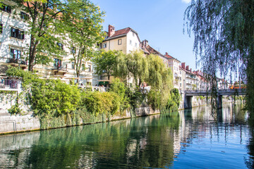 Fototapeta na wymiar Ljubljanica River, downtown Ljubljana. Slovenia