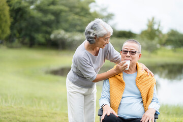Elderly people take care of each other.