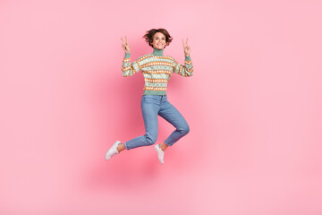 Full length picture of jumping funky girl bob brown hair showing two v sign symbols peace sportive...