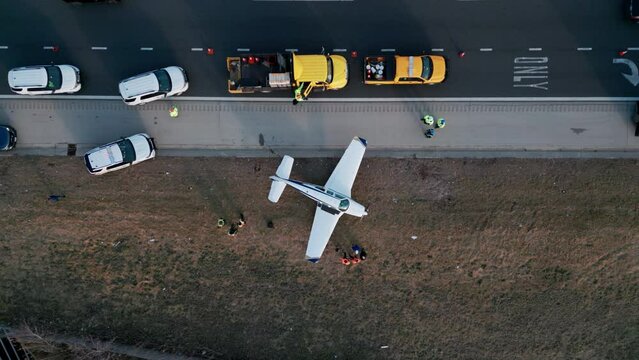 Emergency airplane landing on highway. Drone shot