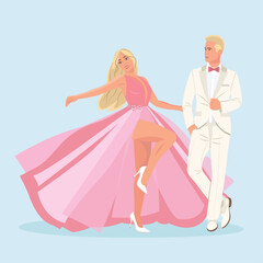 The bride in pink dress and groom in white tuxedo dance at the wedding.