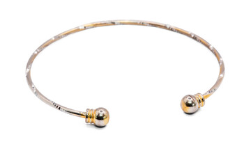 old bangle bracelet made from shiny metal  isolated on  white background,macro photo,has path