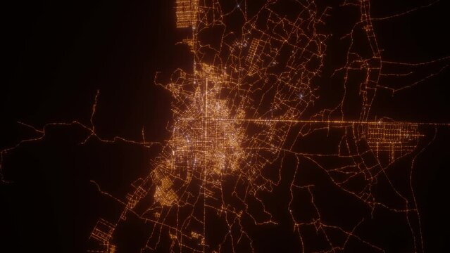 Herat (Afghanistan) aerial view at night. Top view on modern city with street lights. Camera is zooming out, rotating clockwise. Vertical video. The north is on the left side