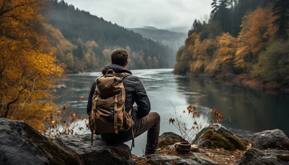 Poster Generative AI, backpacker in autumn landscape, traveler man tourist with backpack hiking in mountains © DELstudio