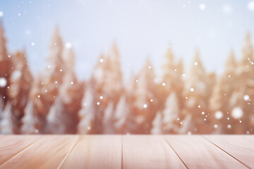 Empty wooden table with blurred fir trees on the background