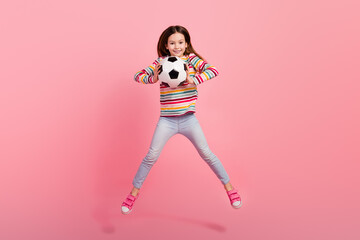 Full body photo cadre of jumper crazy small brown hair champion goalkeeper playing football girl activity isolated on pink color background
