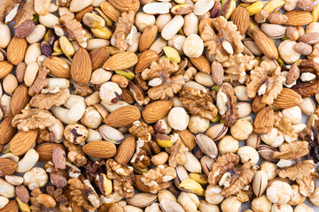 close-up texture of mixed nuts. dried seeds concept.