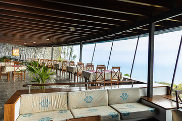 Empty cafe interior with a beautiful view of the sea