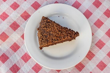 Freshly-baked cake on white plate
