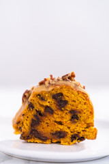 Chocolate pumpkin bundt cake with toffee glaze