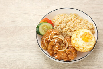 Rice Bowl with Chicken Karaage, egg and vegetables
