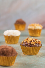 Brigadeiro is a common Brazilian dessert. Delicious chocolate candy Brigadeiro on a table