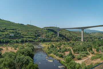 View of the concrete beam bridge named after the writer Miguel Torga over the Douro River, Peso da Regua Portugal