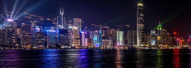 Stunning view of Hong Kong Victoria Harbour at night, illuminated by lights
