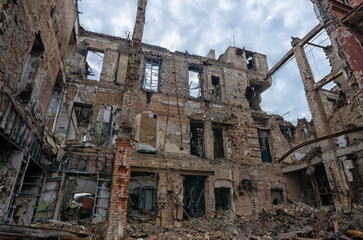 destroyed and burned houses in the city during the war in Ukraine