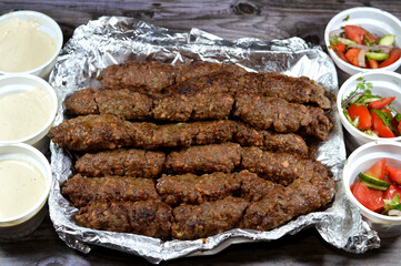 Arabic cuisine traditional food beef Kofta, kebab and tarb kofta shish, minced meat wrapped in lamb...
