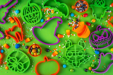 Bright colorful Halloween gingerbread cookies and sweet background. Homemade biscuits with cookie...