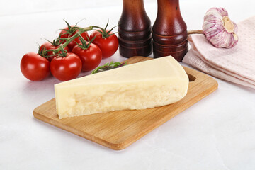 Piece Italian hard parmesan cheese