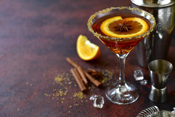 Cocktail with whisky and orange syrup.