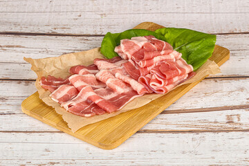 Sliced pork bacon in the bowl