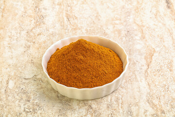 Dry Paprika powder in the bowl