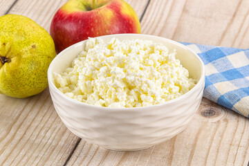 Organic cottage cheese in the bowl