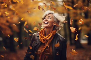 Photo of senior mature happy women in autumn forest