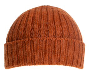 Orange-brown knitted winter bobble hat of traditional design isolated 