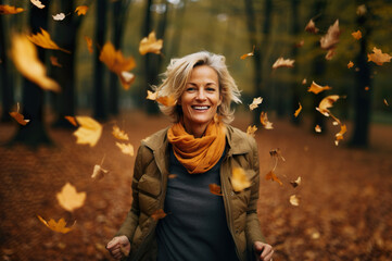 Photo of senior mature happy women in autumn forest