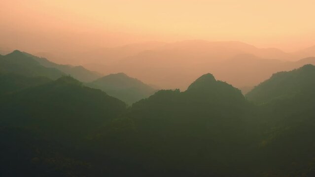 Aerial shot over the mountain during a beautiful sunset
