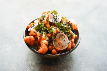 Bang Bang cauliflower,
Popcorn cauliflower with peanut sauce, crispy kale, black sesame, radish,...