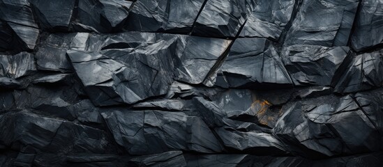 Top view of textured dark stone background with space to copy