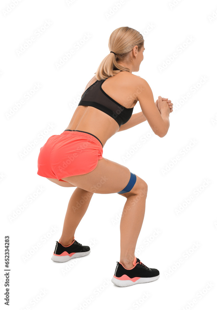 Poster Woman exercising with elastic resistance band on white background, back view