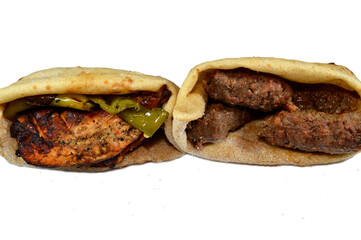 Sandwiches of beef Kofta and tarb kofta shish, minced meat wrapped in lamb fat charcoal grilled and...