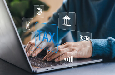 Human with TAX for Individual income tax return paying bill, E-tax, credit card, finance, Data analysis, tax, vat, government, payment, tax refund, budget, debt, money.financial and accounting concept