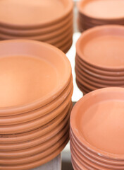 Stacked ceramic dishes for gardening use, botany
