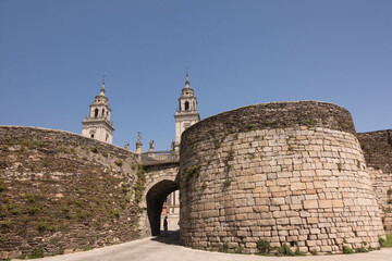 Fototapeta na wymiar Gate in the roman walls of lugo that gives access to the cathedral square in Galicia 