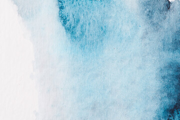 Abstract blue background. Watercolor ink multicolor art collage. Stains, blots and brush strokes of acrylic paint on white paper.