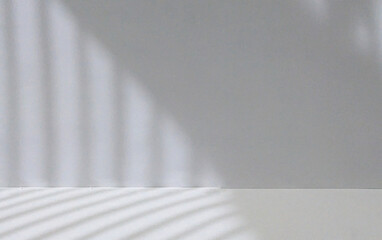 Gray white wall background sunlight light and shadow from window on wall great for mockup product presentation