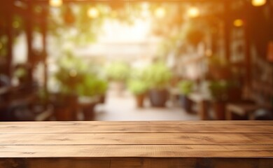 Modern cafe aesthetic. Empty wooden table in soft bokeh light. Vintage counter in eatery. Abstract montage of rustic dark tabletop