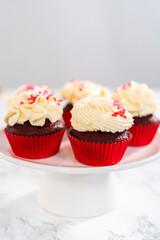 Red Velvet Cupcakes with White Chocolate Ganache Frosting